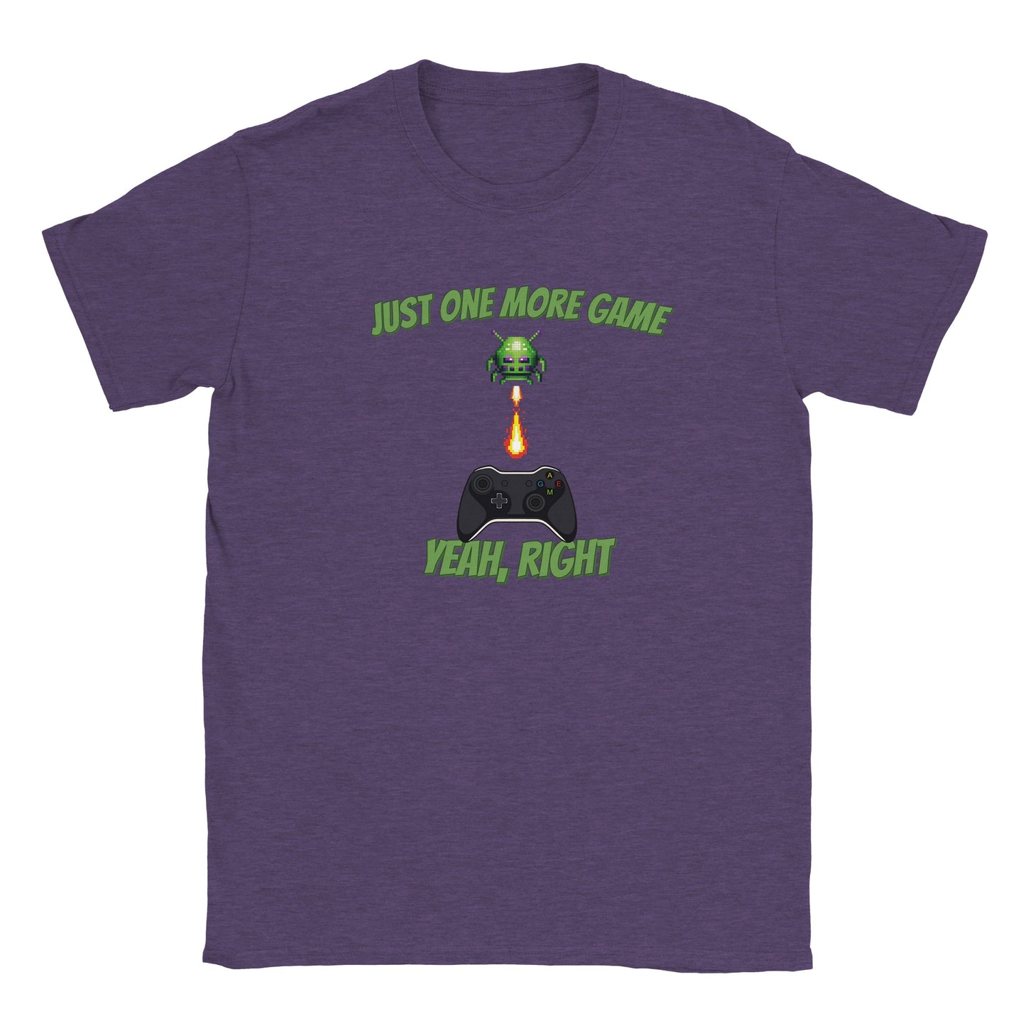 A purple t-shirt with an Alien firing on a game controller with the words, "Just one more game" in pale green just above it.
Beneath the controller are the words, "Yeah, right", also in pale green