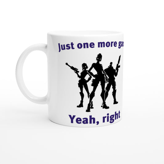 White coffee mug. Three silhouette outlines of strong video game characters with glowing white eyes. 

Game controller underneath it firing yellow fireballs.

At the top are the words, "Just one more game" in dark blue.

At the bottom are the words, "Yeah, right" in dark blue.